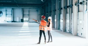 facilities management workers inside a warehouse