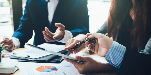 three people discussing business continuity