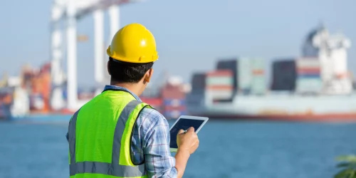 Why Irish Businesses Need ISO 17020 1 man inspecting a shipyard