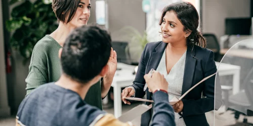 3 people talking about ISO 55001