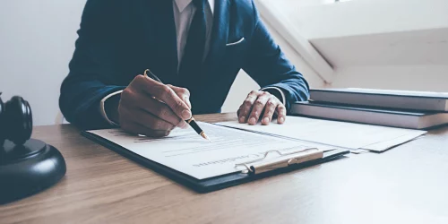 A man completing a management review